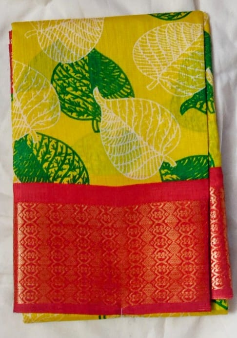 yellow silk saree with red border
