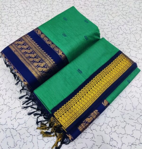 bottle green silk saree with rich pallu